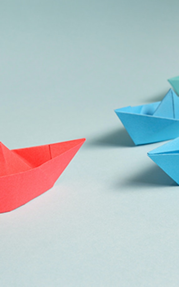 Coloured paper boats CEOs Forum