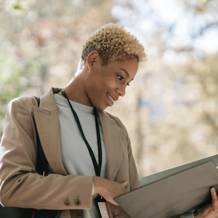 A woman reads the terms and conditions and is pleased at how fair they are.