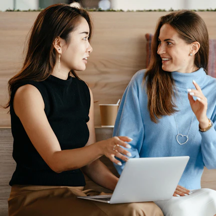 Two people discussing advice from Global Connections Jobs and Mission