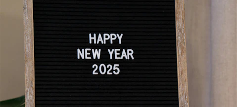 A black board with 2025 written on it.