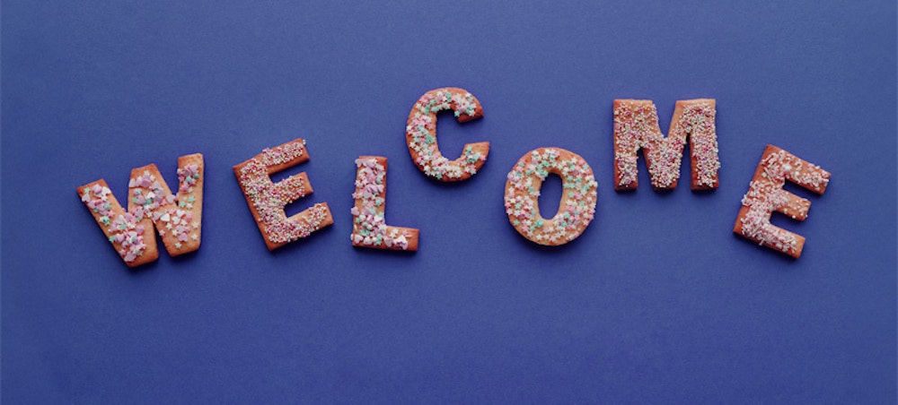 Cookies cut into the shape of the word welcome