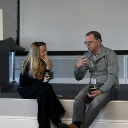 Two members of the Global Connections Network support each other.